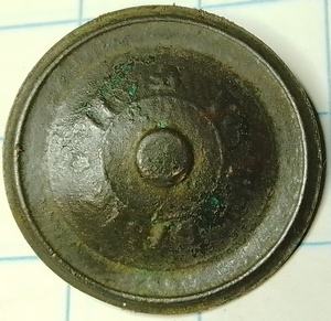 Knoop bevestiging oogje door achterplaat